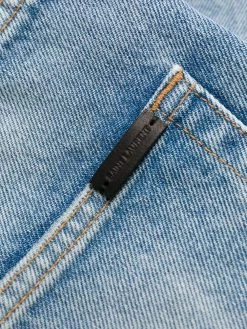 Saint Laurent frayed-edge denim shorts