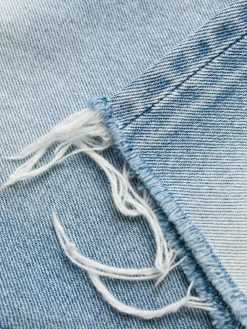 Saint Laurent frayed-edge denim shorts