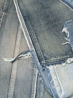 Saint Laurent patchwork denim cape dress