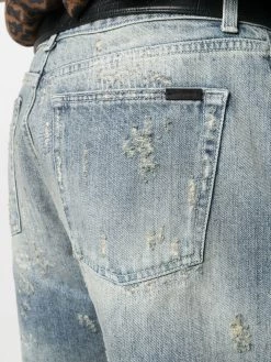 Saint Laurent faded distressed denim shorts