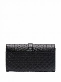 Saint Laurent large flap wallet in grain de poudre embossed leather