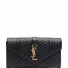 Saint Laurent large flap wallet in grain de poudre embossed leather