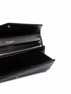 Saint Laurent large flap wallet in grain de poudre embossed leather