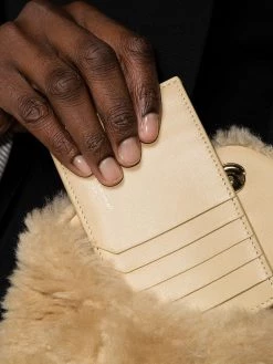 Saint Laurent Puffer shearling clutch